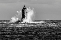Waves Break Around Whaleback Light in Maine -BW